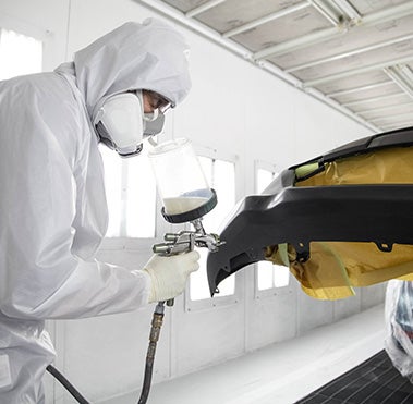 Collision Center Technician Painting a Vehicle | Longo Toyota in El Monte CA