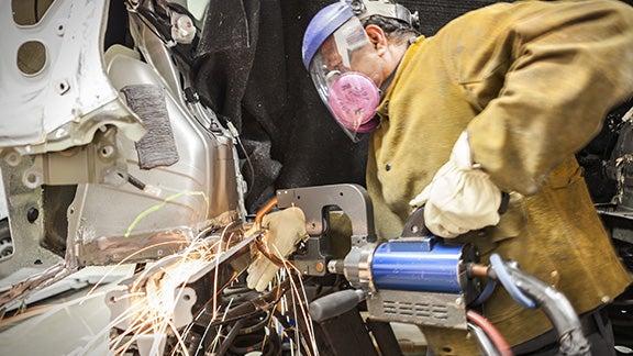 Collision Center Technician Repairing Vehicle | Longo Toyota in El Monte CA