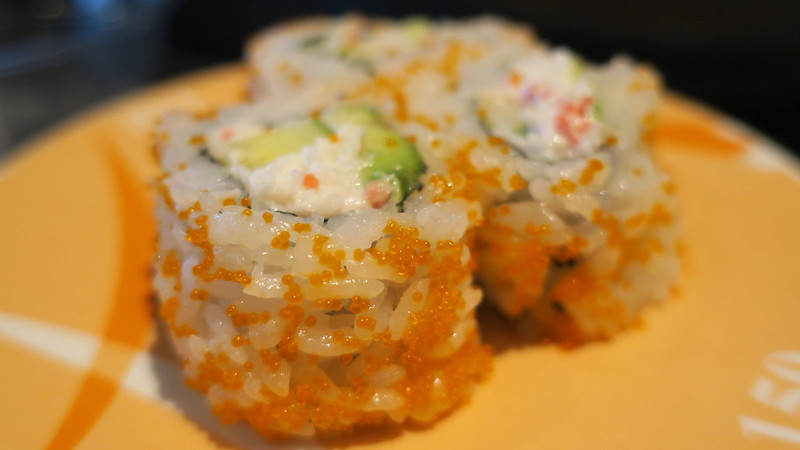 A Plate Filled With Sushi Rolls